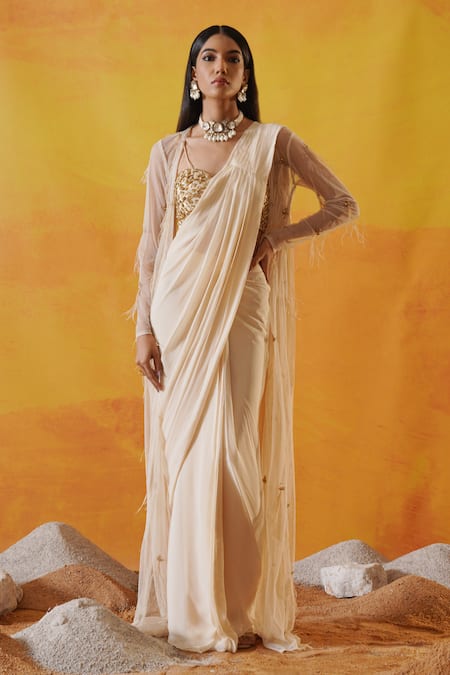 Kapda Dori Ivory Silk, Net, Viscose, Georgette Embellished Pre-draped Saree And Jacket Set at Aza Fashions Kapda Dori_Ivory Silk, Net, Viscose, Georgette Embellished Pre-draped Saree And Jacket Set _at_Aza_Fashions
