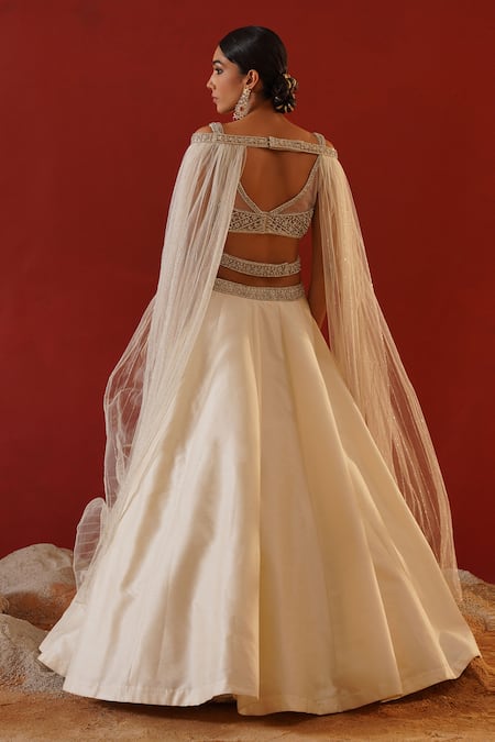 Kapda Dori Ivory Silk, Net Sequins, Crystals Sweetheart Embroidered Lehenga And Cape Set Online at Aza Fashions Kapda Dori_Ivory Silk, Net Sequins, Crystals Sweetheart Embroidered Lehenga And Cape Set _Online_at_Aza_Fashions