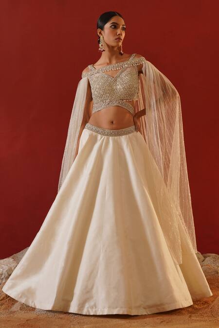 Buy Kapda Dori Ivory Silk, Net Sequins, Crystals Sweetheart Embroidered Lehenga And Cape Set Online at Aza Fashions Buy_Kapda Dori_Ivory Silk, Net Sequins, Crystals Sweetheart Embroidered Lehenga And Cape Set _Online_at_Aza_Fashions