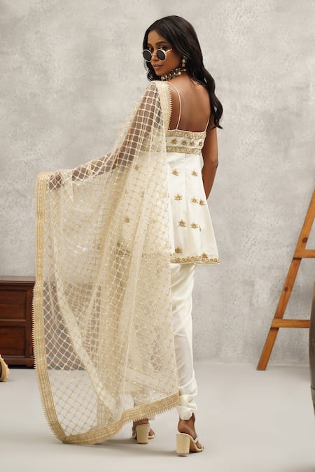 Shop Kapda Dori White Net, Linen Zari, Sequins, Cut Work Floral Embroidered Peplum Kurta Set at Aza Fashions Shop_Kapda Dori_White Net, Linen Zari, Sequins, Cut Work Floral Embroidered Peplum Kurta Set _at_Aza_Fashions