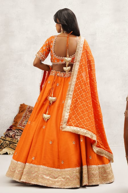 Shop Kapda Dori Orange Silk, Organza Cut Work, Sequins, Pearls Embroidered Rust Lehenga Set at Aza Fashions Shop_Kapda Dori_Orange Silk, Organza Cut Work, Sequins, Pearls Embroidered Rust Lehenga Set _at_Aza_Fashions