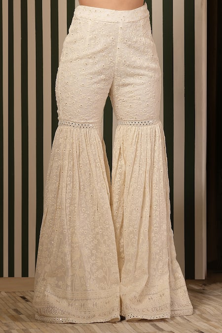 Soniya G_Ivory Georgette Embroidery, Metallic Thread, Tassels Round Chikankari Kurta Set _Online_at_Aza_Fashions