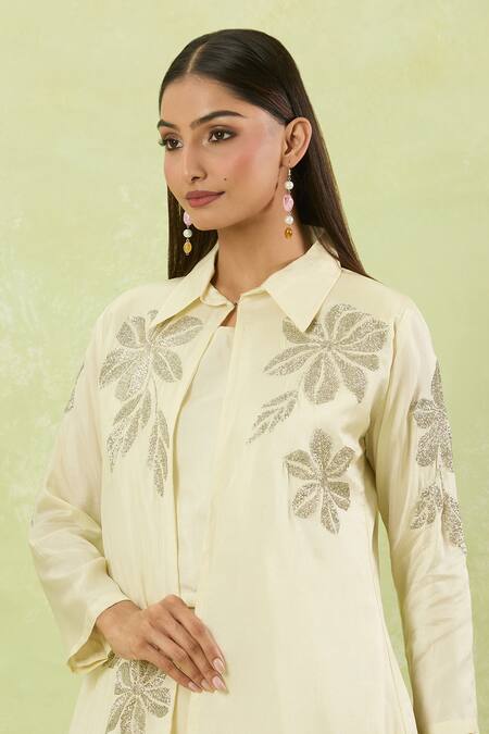 Buy Studio A Ivory Silk Cut Work Collared Cutdana Bloom Embroidered Jacket And Palazzo Set Online at Aza Fashions Buy_Studio A_Ivory Silk Cut Work Collared Cutdana Bloom Embroidered Jacket And Palazzo Set _Online_at_Aza_Fashions