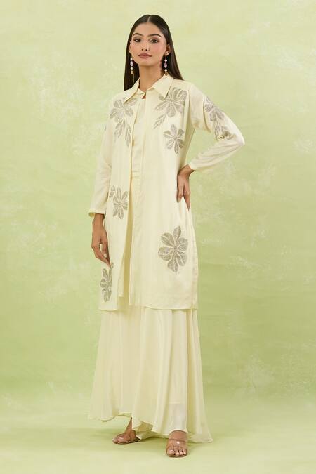 Studio A Ivory Silk Cut Work Collared Cutdana Bloom Embroidered Jacket And Palazzo Set at Aza Fashions Studio A_Ivory Silk Cut Work Collared Cutdana Bloom Embroidered Jacket And Palazzo Set _at_Aza_Fashions