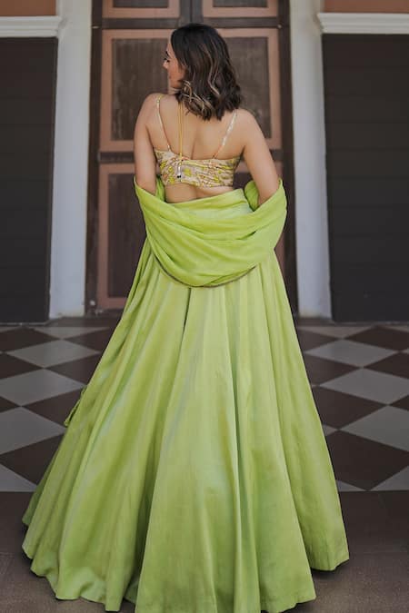 Shop Koswi Cream Viscose Sequins, Beads V-neck Geometric Embroidered Lehenga Set at Aza Fashions Shop_Koswi_Cream Viscose Sequins, Beads V-neck Geometric Embroidered Lehenga Set _at_Aza_Fashions