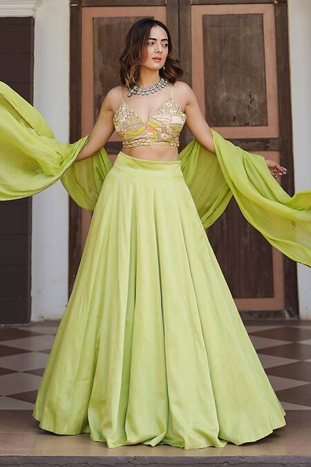 Koswi Cream Viscose Sequins, Beads V-neck Geometric Embroidered Lehenga Set at Aza Fashions Koswi_Cream Viscose Sequins, Beads V-neck Geometric Embroidered Lehenga Set _at_Aza_Fashions