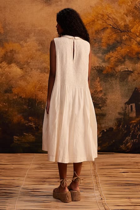 Shop Ahmev Ivory Cotton Collared Peter Pan Midi Dress at Aza Fashions Shop_Ahmev_Ivory Cotton Collared Peter Pan Midi Dress _at_Aza_Fashions