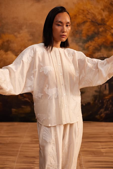 Buy Ahmev Ivory Cotton, Silk Embroidery Round Neck Applique Dolman Pleated Shirt Online at Aza Fashions Buy_Ahmev_Ivory Cotton, Silk Embroidery Round Neck Applique Dolman Pleated Shirt _Online_at_Aza_Fashions