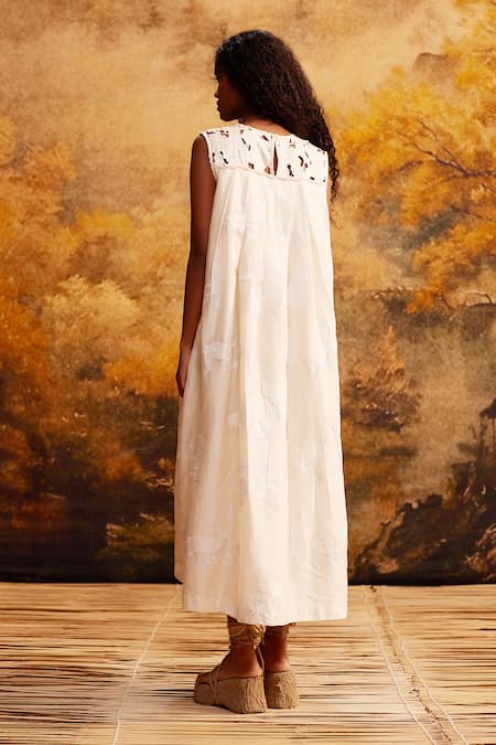Shop Ahmev Ivory Cotton, Silk Cut Work Round Neck Knife Pleat Embroidered Midi Dress at Aza Fashions Shop_Ahmev_Ivory Cotton, Silk Cut Work Round Neck Knife Pleat Embroidered Midi Dress _at_Aza_Fashions