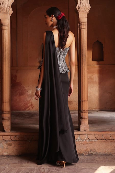 Shop Label Moni K Black Net, Satin Pearls, Sequins, Cut Embroidered Corset And Pre-draped Saree Set at Aza Fashions Shop_Label Moni K_Black Net, Satin Pearls, Sequins, Cut Embroidered Corset And Pre-draped Saree Set _at_Aza_Fashions
