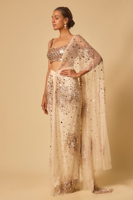 Masumi Mewawalla Beige Tulle, Silk, Linen Sequins, Beads Square Neck Floral Pre-draped Saree Set at Aza Fashions Masumi Mewawalla_Beige Tulle, Silk, Linen Sequins, Beads Square Neck Floral Pre-draped Saree Set _at_Aza_Fashions