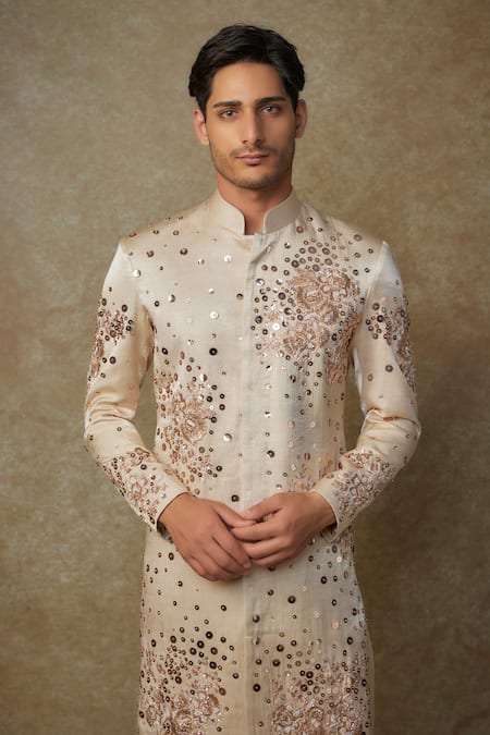Shop Masumi Mewawalla Beige Silk, Cotton Cut Work, Sequins, Zari Embroidered Sherwani And Pant Set Online at Aza Fashions Shop_Masumi Mewawalla_Beige Silk, Cotton Cut Work, Sequins, Zari Embroidered Sherwani And Pant Set _Online_at_Aza_Fashions