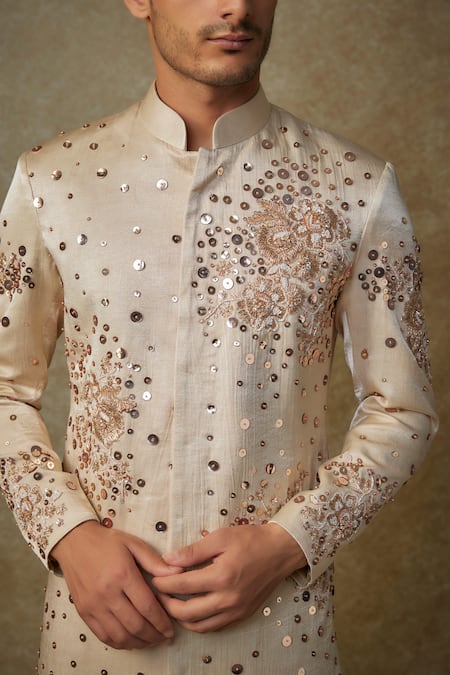 Masumi Mewawalla Beige Silk, Cotton Cut Work, Sequins, Zari Embroidered Sherwani And Pant Set at Aza Fashions Masumi Mewawalla_Beige Silk, Cotton Cut Work, Sequins, Zari Embroidered Sherwani And Pant Set _at_Aza_Fashions
