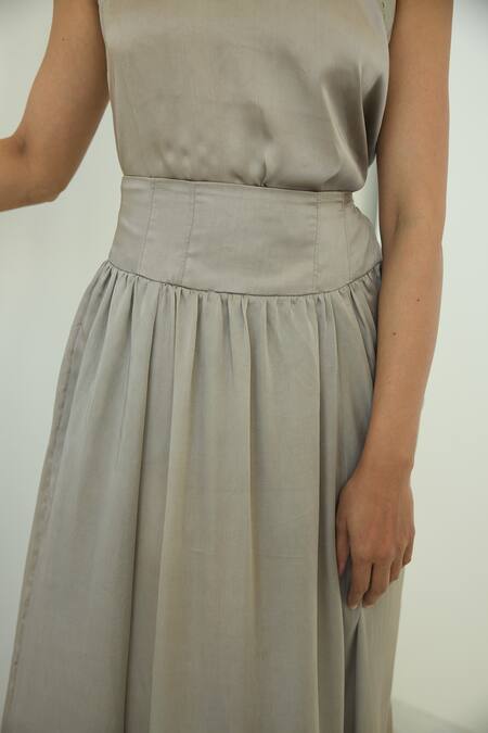 Buy_Shop Nirvanaa_Silver Solid Pleated Midi Skirt _Online_at_Aza_Fashions