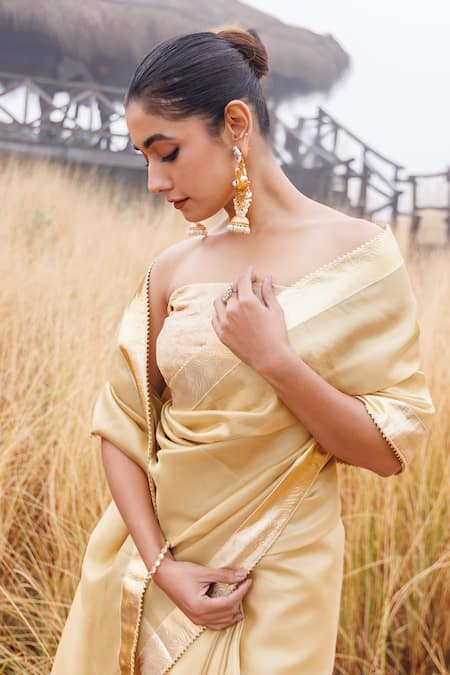 Shop_Geroo Jaipur_Beige Tissue Gota Patti Round Neck Border Woven Saree _Online_at_Aza_Fashions