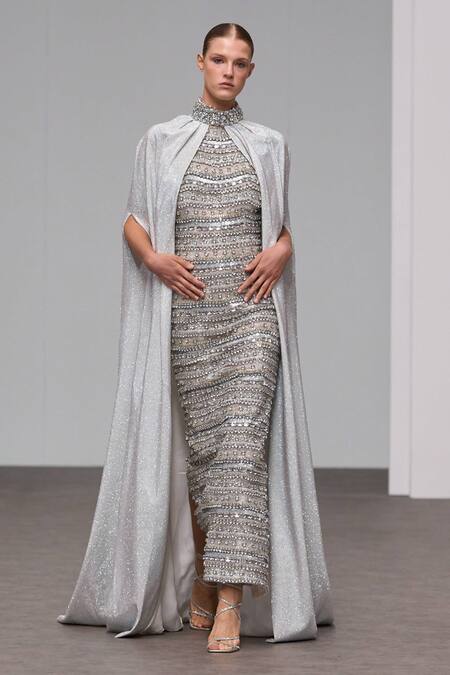 Shop Itrh Silver Net Sequins, Crystals Halter Neck Embroidered Maxi Dress And Cape Online at Aza Fashions Shop_Itrh_Silver Net Sequins, Crystals Halter Neck Embroidered Maxi Dress And Cape _Online_at_Aza_Fashions