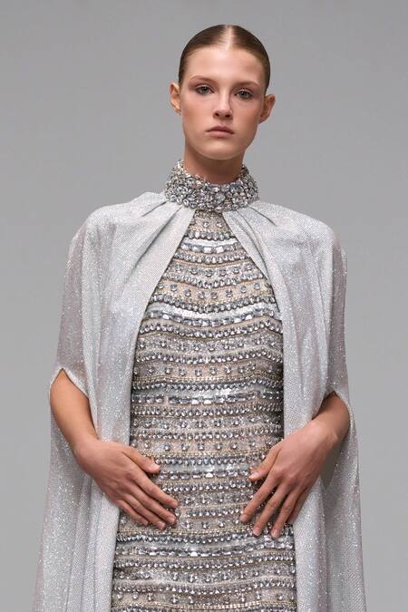 Itrh Silver Net Sequins, Crystals Halter Neck Embroidered Maxi Dress And Cape at Aza Fashions Itrh_Silver Net Sequins, Crystals Halter Neck Embroidered Maxi Dress And Cape _at_Aza_Fashions