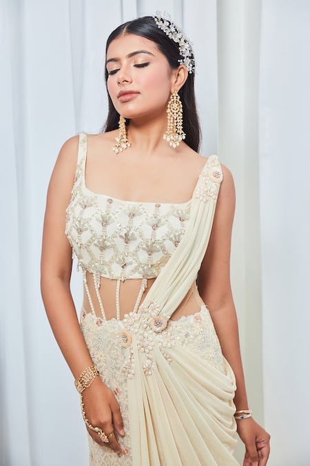 Shop Saaj By Ankita Yellow Georgette Sequins, Pearls Square Neck Embroidered Saree Gown Online at Aza Fashions Shop_Saaj By Ankita_Yellow Georgette Sequins, Pearls Square Neck Embroidered Saree Gown _Online_at_Aza_Fashions