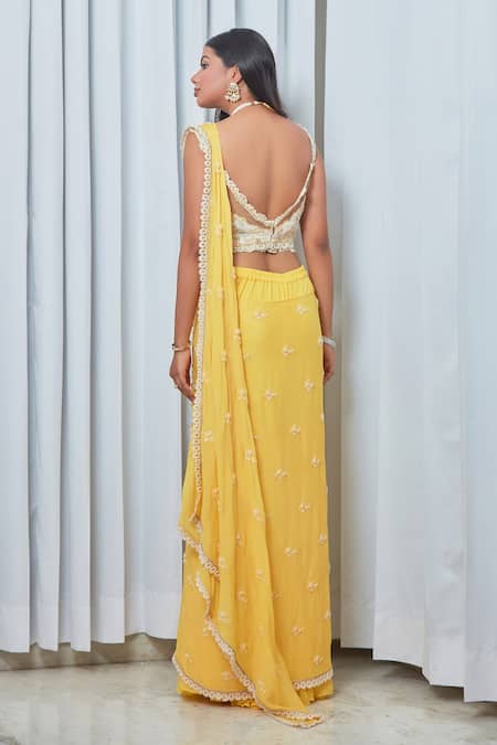 Shop Saaj By Ankita Ivory Georgette Mirrors, Pearls, Embroidery V-neck Blouse And Sharara Set at Aza Fashions Shop_Saaj By Ankita_Ivory Georgette Mirrors, Pearls, Embroidery V-neck Blouse And Sharara Set _at_Aza_Fashions