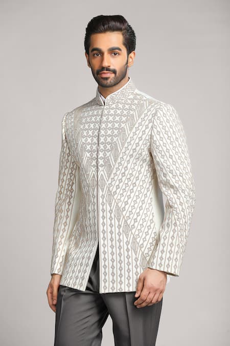 Char Chaand_Ivory Linen, Silk Cut Work Geometric Dori And Cutdana Bandhgala _at_Aza_Fashions
