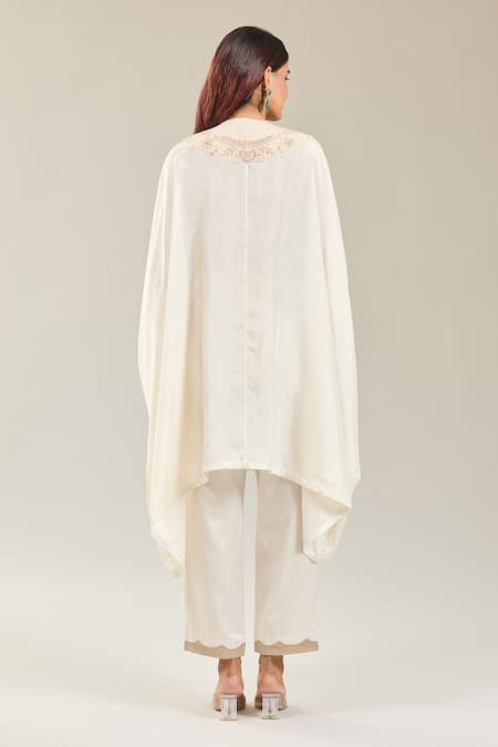 Shop Prisho Ivory Silk Embroidery Round Neck Floral Resham Kaftan And Pant at Aza Fashions Shop_Prisho_Ivory Silk Embroidery Round Neck Floral Resham Kaftan And Pant _at_Aza_Fashions