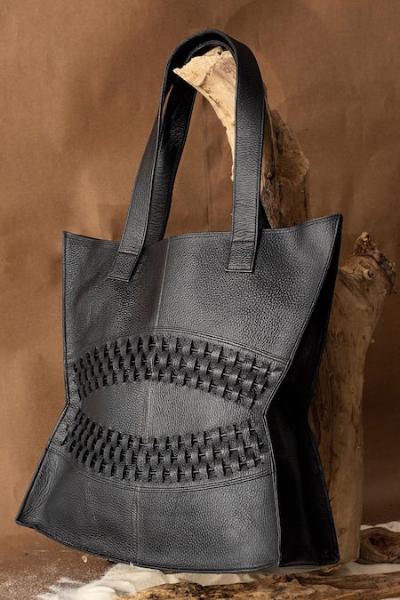 Shop Econock Studio Black Cut Work Handcrafted Leather Tote Bag at Aza Fashions Shop_Econock Studio_Black Cut Work Handcrafted Leather Tote Bag _at_Aza_Fashions