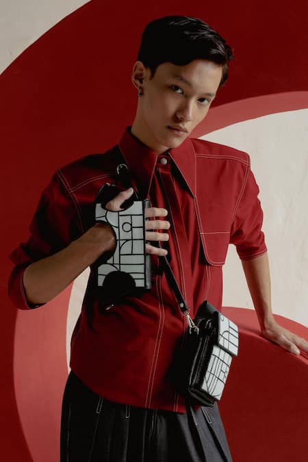 Shop Econock Studio Black Geometric Design Leather Wristlet at Aza Fashions Shop_Econock Studio_Black Geometric Design Leather Wristlet _at_Aza_Fashions