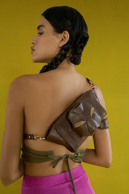 Econock Studio Brown Embroidery, Zari Leather Threadwork Wristlet Bag at Aza Fashions Econock Studio_Brown Embroidery, Zari Leather Threadwork Wristlet Bag _at_Aza_Fashions