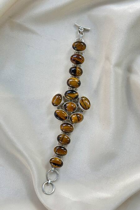Shop Anuka Jewels Brown Stones Gold Tiger Eye Bracelet at Aza Fashions Shop_Anuka Jewels_Brown Stones Gold Tiger Eye Bracelet _at_Aza_Fashions