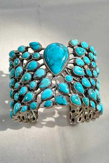 Shop Anuka Jewels Turquoise Stones Leaf Carved Cuff Bracelet at Aza Fashions Shop_Anuka Jewels_Turquoise Stones Leaf Carved Cuff Bracelet _at_Aza_Fashions