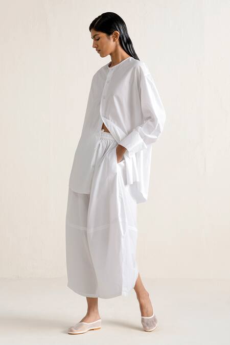 Ituvana White Cotton Round Neck Button Down Shirt And Pear Shaped Skirt Set Online at Aza Fashions Ituvana_White Cotton Round Neck Button Down Shirt And Pear Shaped Skirt Set _Online_at_Aza_Fashions