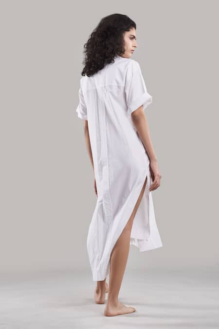 Shop Ituvana White Cotton Collared Asymmetric Shirt Dress at Aza Fashions Shop_Ituvana_White Cotton Collared Asymmetric Shirt Dress _at_Aza_Fashions
