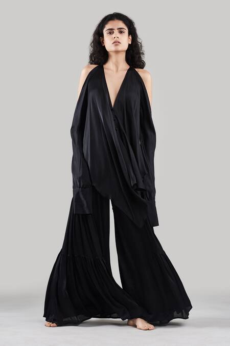 Ituvana Black Silk Plunge Neck Cold Shoulder Top And Flared Pant Set Online at Aza Fashions Ituvana_Black Silk Plunge Neck Cold Shoulder Top And Flared Pant Set _Online_at_Aza_Fashions