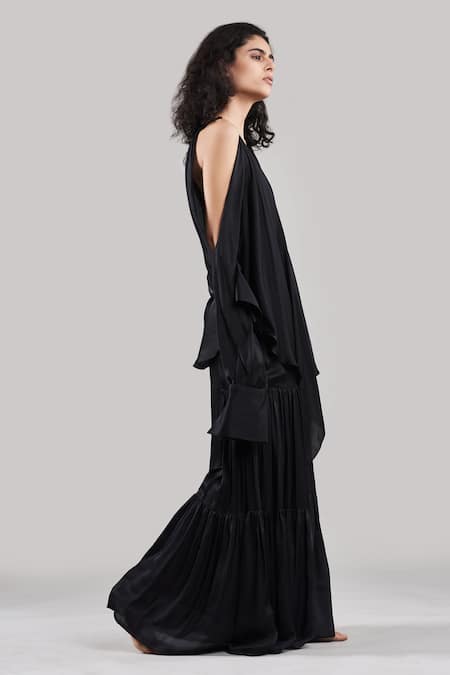 Ituvana Black Silk Plunge Neck Cold Shoulder Top And Flared Pant Set at Aza Fashions Ituvana_Black Silk Plunge Neck Cold Shoulder Top And Flared Pant Set _at_Aza_Fashions