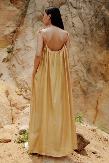 Shop_Ituvana_Gold Silk Square Neck Shoulder Tie Maxi Dress _at_Aza_Fashions