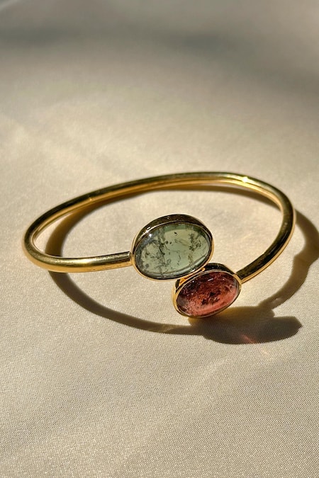 Shop Anuka Jewels Gold Plated Stones Twisted Tourmaline Bracelet at Aza Fashions Shop_Anuka Jewels_Gold Plated Stones Twisted Tourmaline Bracelet _at_Aza_Fashions