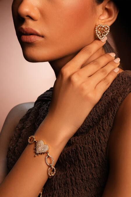 Bijoux By Priya Chandna Gold Plated Crystals Heart Stud Earrings Online at Aza Fashions Bijoux By Priya Chandna_Gold Plated Crystals Heart Stud Earrings _Online_at_Aza_Fashions