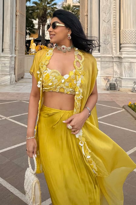 One Knot One By Ashna Yellow Crepe, Silk Satin Sequins, Zari Zardozi Embroidered Cape Skirt Set Online at Aza Fashions One Knot One By Ashna_Yellow Crepe, Silk Satin Sequins, Zari Zardozi Embroidered Cape Skirt Set _Online_at_Aza_Fashions