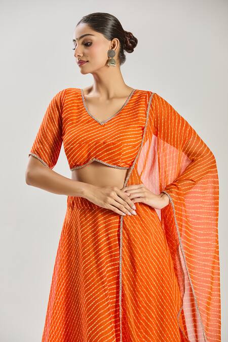 Buy Naintara Bajaj Orange Georgette Lace V-neck Embellished Lehenga Set Online at Aza Fashions Buy_Naintara Bajaj_Orange Georgette Lace V-neck Embellished Lehenga Set_Online_at_Aza_Fashions