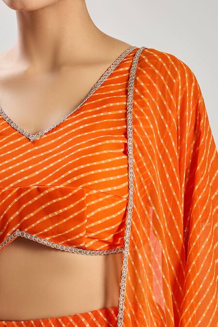 Shop Naintara Bajaj Orange Georgette Lace V-neck Embellished Lehenga Set Online at Aza Fashions Shop_Naintara Bajaj_Orange Georgette Lace V-neck Embellished Lehenga Set_Online_at_Aza_Fashions
