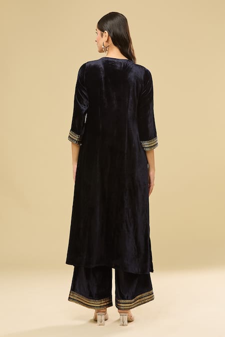 Shop Pouli Pret Blue Velvet, Cotton Pearls, Sequins, Zari V-neck Navy Embroidered Kurta Set at Aza Fashions Shop_Pouli Pret_Blue Velvet, Cotton Pearls, Sequins, Zari V-neck Navy Embroidered Kurta Set _at_Aza_Fashions