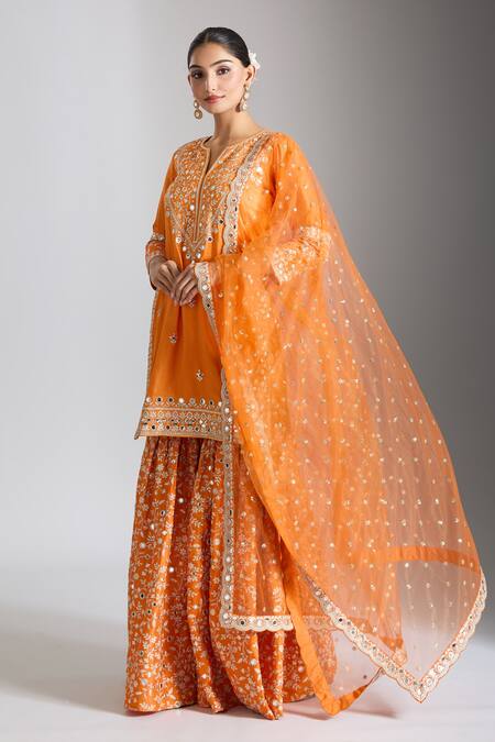 Buy Gopi Vaid Orange Tussar, Net Embroidery, Mirrors Round Neck Embellished Kurta Sharara Set Online at Aza Fashions Buy_Gopi Vaid_Orange Tussar, Net Embroidery, Mirrors Round Neck Embellished Kurta Sharara Set _Online_at_Aza_Fashions