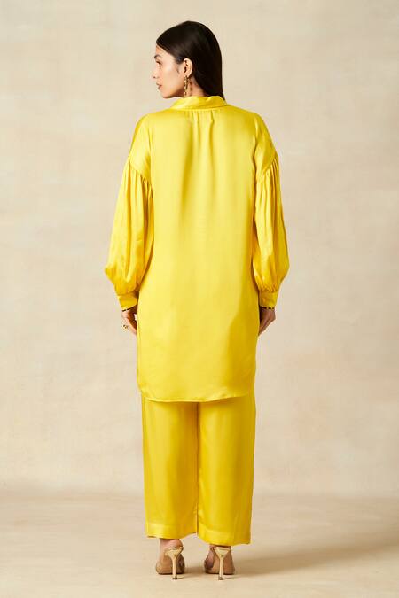 Shop Gulabo By Abu Sandeep Yellow Modal, Satin Collared Solid High Low Tunic And Pant Set at Aza Fashions Shop_Gulabo By Abu Sandeep_Yellow Modal, Satin Collared Solid High Low Tunic And Pant Set _at_Aza_Fashions