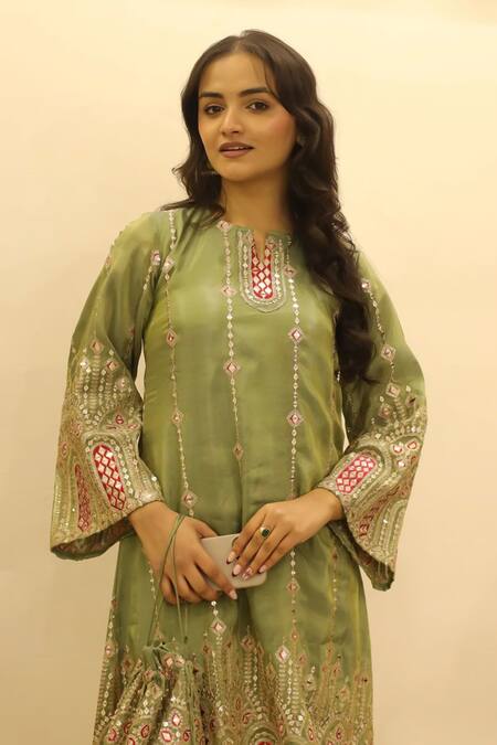 Shop Tasuvure Indes Green Tissue Zari, Sequins, Mirrors Open Embroidered Kurta Set With Potli Bag at Aza Fashions Shop_Tasuvure Indes_Green Tissue Zari, Sequins, Mirrors Open Embroidered Kurta Set With Potli Bag_at_Aza_Fashions