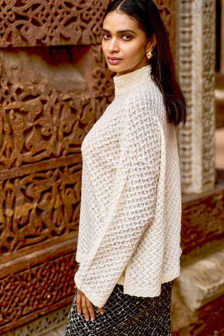 Shop Dash And Dot Ivory Cotton, Acrylic, Wool High Neck Geometric Knit Full Sleeve Top Shop_Dash And Dot_Ivory Cotton, Acrylic, Wool High Neck Geometric Knit Full Sleeve Top