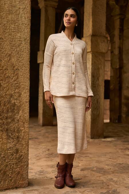 Dash And Dot Ivory Polyester Shawl Neck Textured Knit Top And Midi Skirt Set at Aza Fashions Dash And Dot_Ivory Polyester Shawl Neck Textured Knit Top And Midi Skirt Set _at_Aza_Fashions