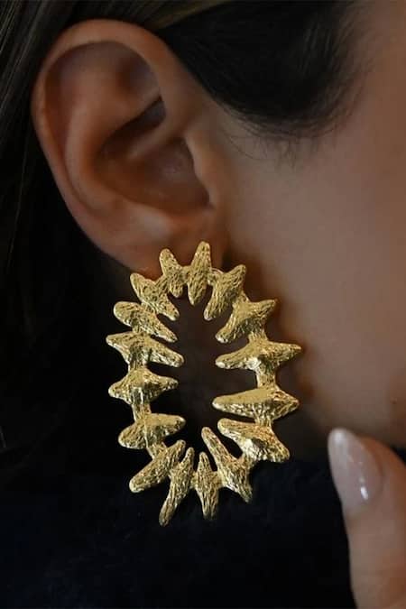 Shop Eurumme Gold Plated Glow Tribal Wild Flower Earrings at Aza Fashions Shop_Eurumme_Gold Plated Glow Tribal Wild Flower Earrings_at_Aza_Fashions