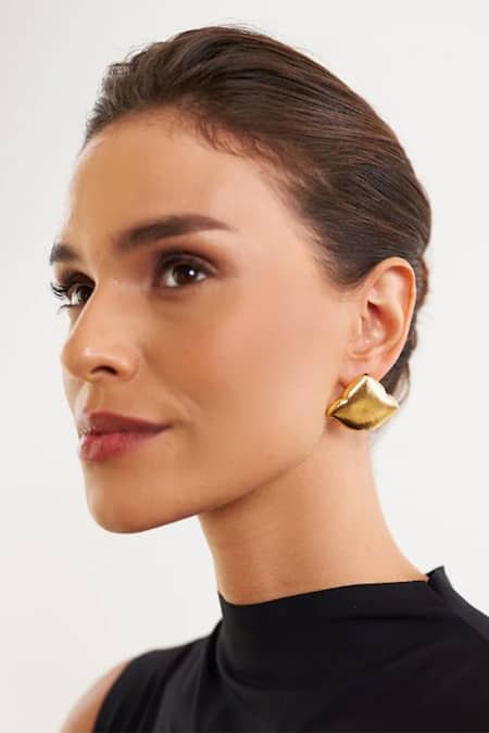 Shop Eurumme Gold Plated Leaf Pattern Stud Earrings at Aza Fashions Shop_Eurumme_Gold Plated Leaf Pattern Stud Earrings_at_Aza_Fashions