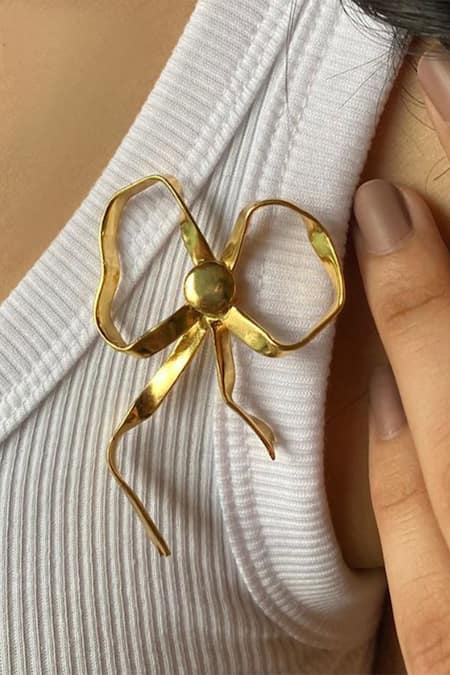 Shop Eurumme Gold Plated Bows Pattern Brooch at Aza Fashions Shop_Eurumme_Gold Plated Bows Pattern Brooch_at_Aza_Fashions