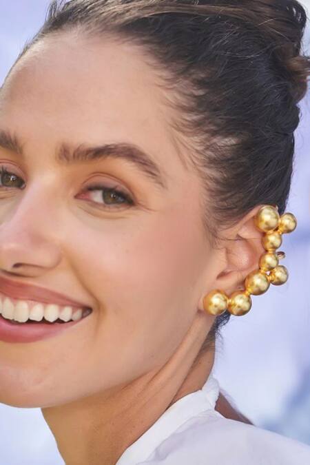 Shop Eurumme Gold Plated Hemisphere Pattern Ear Cuff at Aza Fashions Shop_Eurumme_Gold Plated Hemisphere Pattern Ear Cuff_at_Aza_Fashions